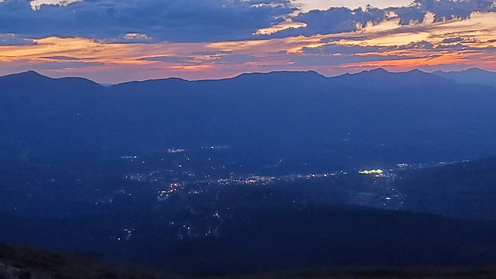A View of Breckenridge, Colorado, With The Sun Setting, From Mt. Baldy