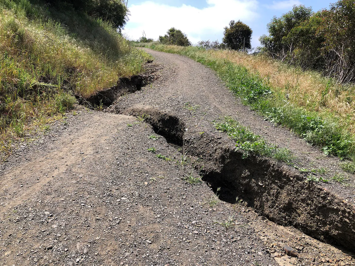 Spring rain damage to Hollyhock Fire Road in Mandeville Canyon in Brentwood, California