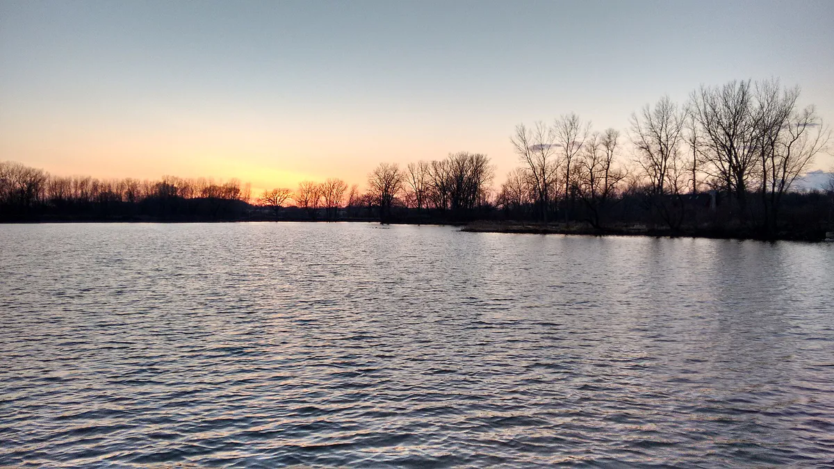 Sunset over Fox Brook Park's Pond in Brookfield, Wisconsin