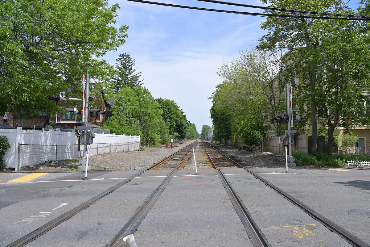 MBTA Fitchburg Line at Sherman Street crossing in Cambridge MA looking east May 2026, Massachusetts