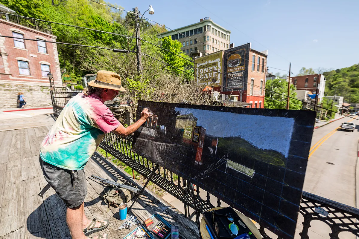 Artist working in downtown Eureka Springs, Arkansas
