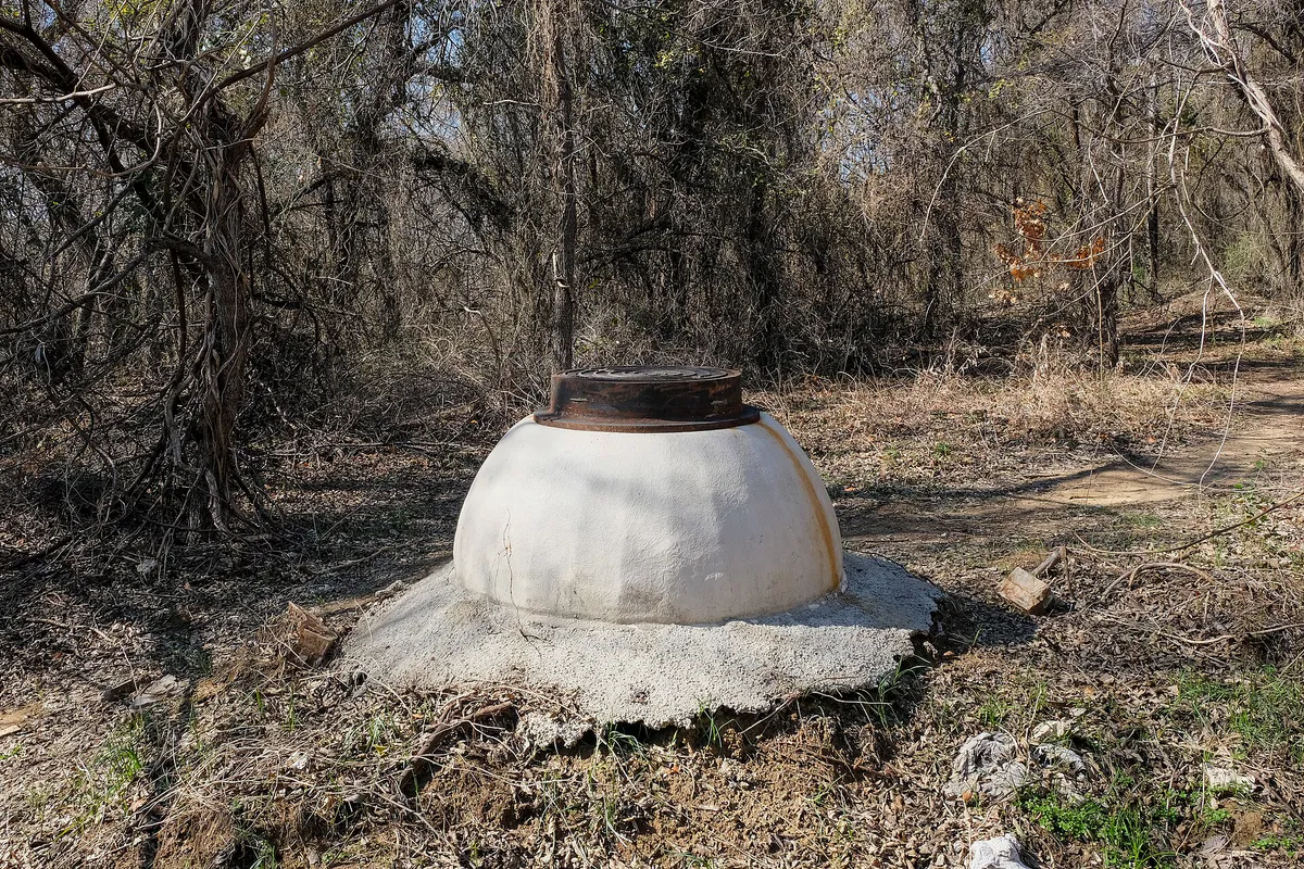 Elevated manhole in the floodplain of Timber Creek · Lewisville, Texas · 2023-02-11-3770