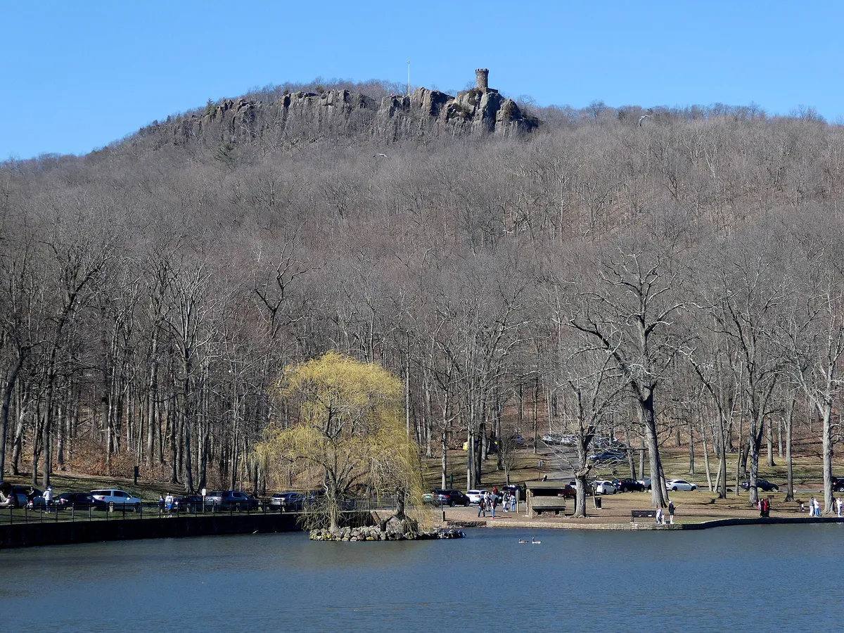 Mirror Lake and Castle Craig, March 2023 in Meriden, Connecticut