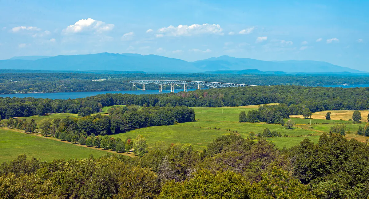 Catskill Escarpment and Kingston-Rhinecliff Bridge from Ferncliff Forest firetower in Rhinebeck, New York