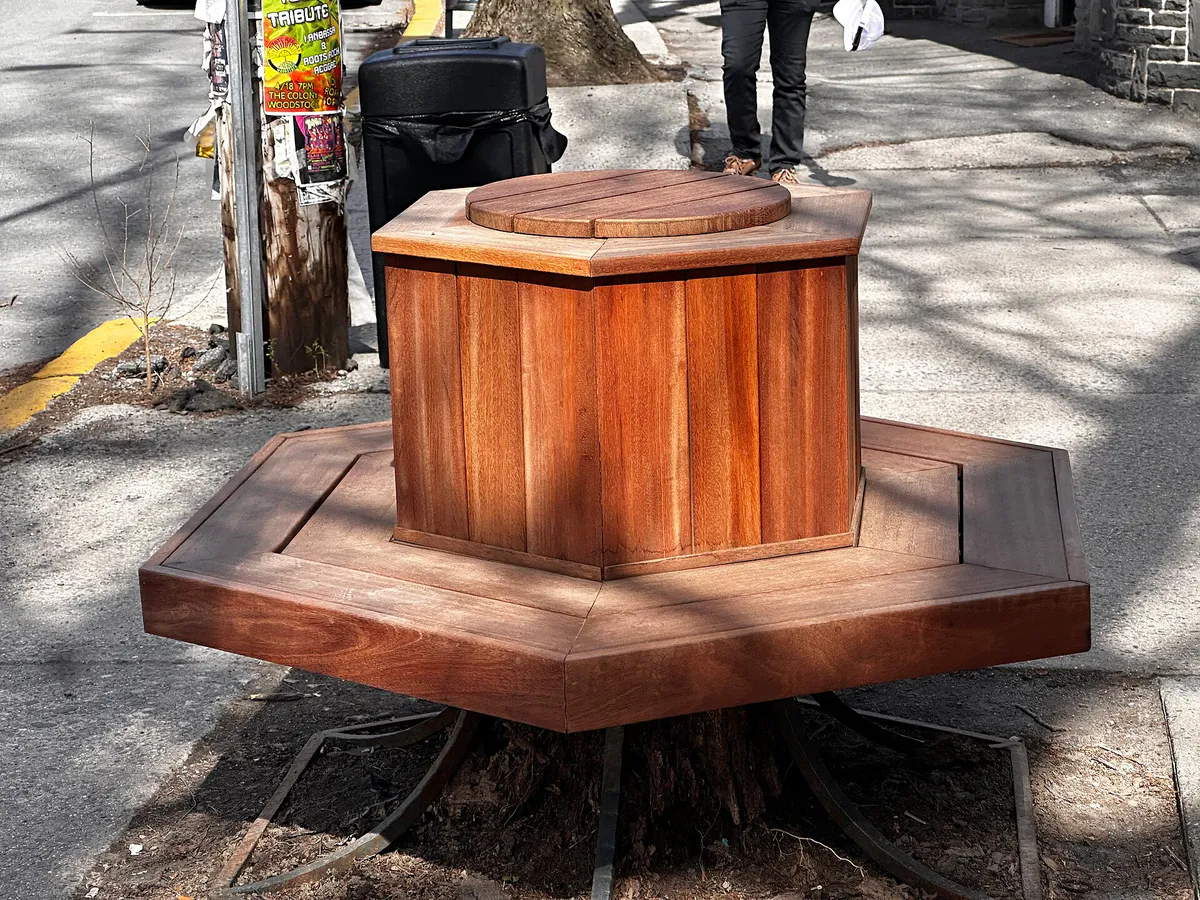 Hexagonal wrap around bench in Woodstock, NY, taking the place of a sidewalk tree that had died, New York